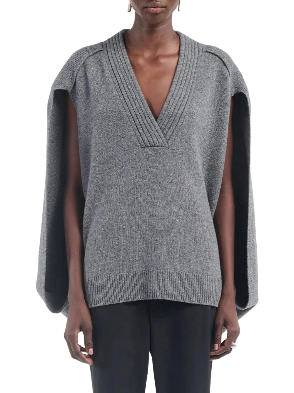 Full view of the Cocoon Cape Sweater in Medium Heather Grey worn casually.