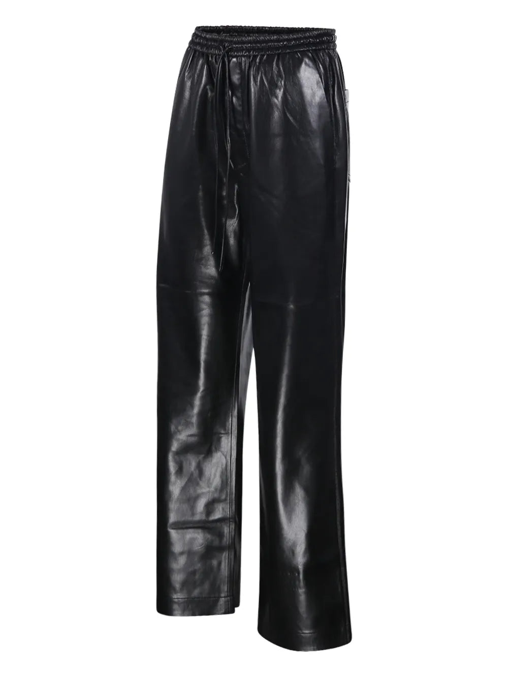 Close-up view of the black Nanushka Calie Trousers highlighting the Okober alt-leather texture.