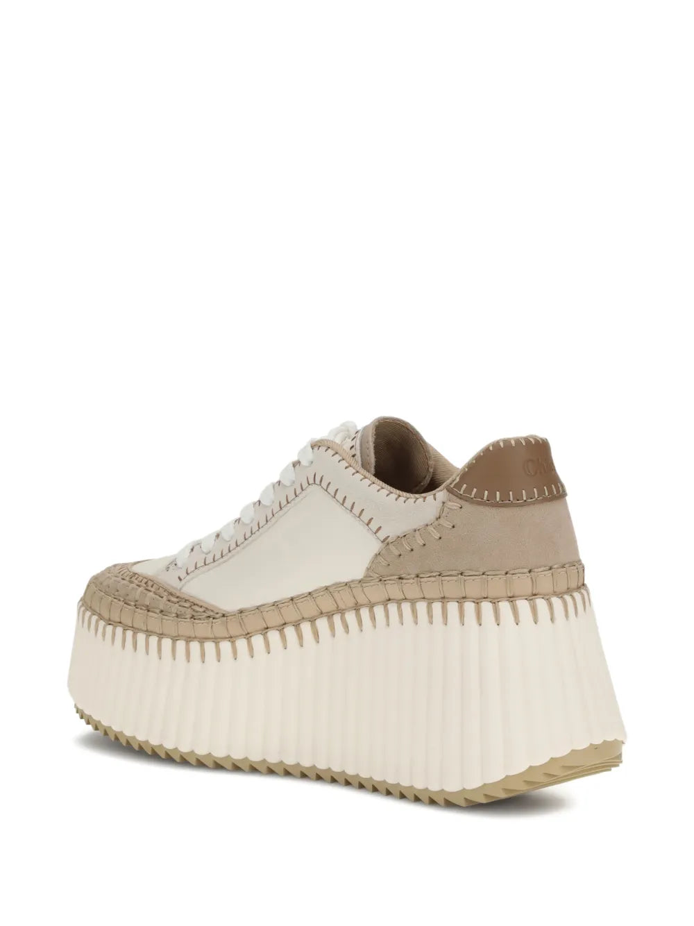 Side view of Chloé Nama Wedge Sneaker in Soft Powder, highlighting the unique lightweight recycled sole.