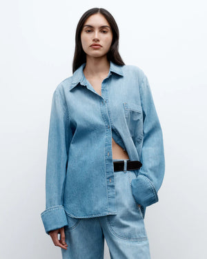 Stylish close-up of the Wilson Shirt in Vintage Wash, illustrating the soft texture of 100% cotton denim.