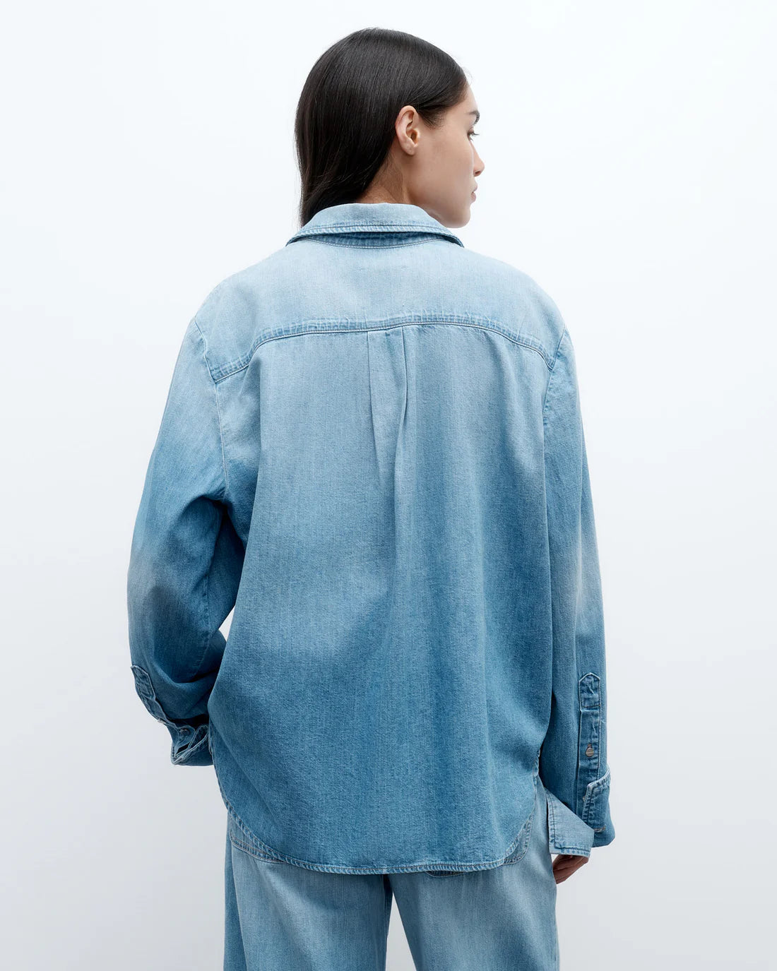 Elegant lifestyle shot of the Wilson Shirt in Vintage Wash by TWP, perfect for casual yet stylish occasions.