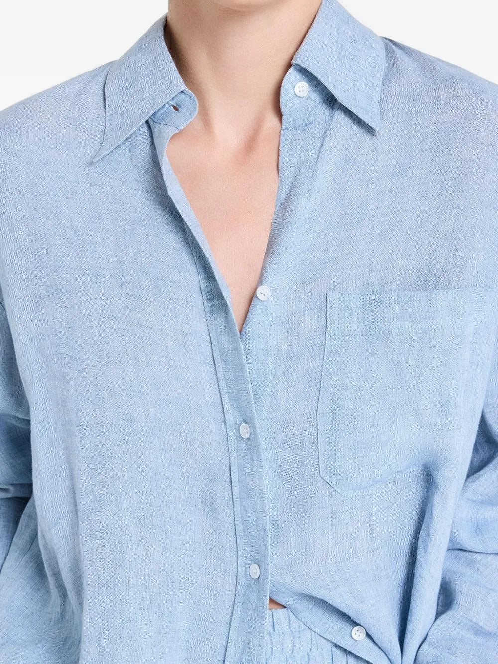 Back view of Big Joe Shirt in Light Indigo displaying the distressed effect and comfortable oversized design.