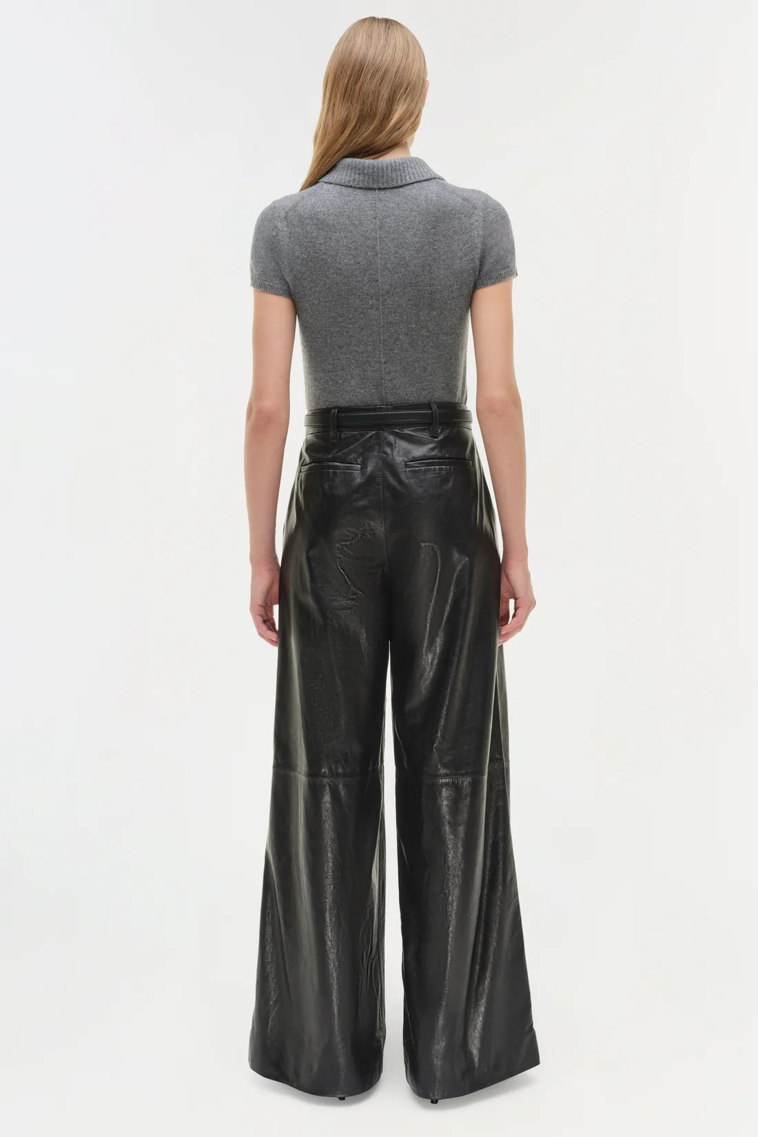 Black Kobie Wide Leg Leather Pant by Simkhai displayed on a model highlighting the fit and design.