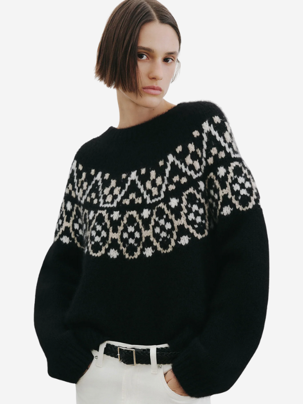 Nili Lotan Chrissy Sweater in Black - Detail shot showing 1x1 rib at hem, sleeve, and neckline