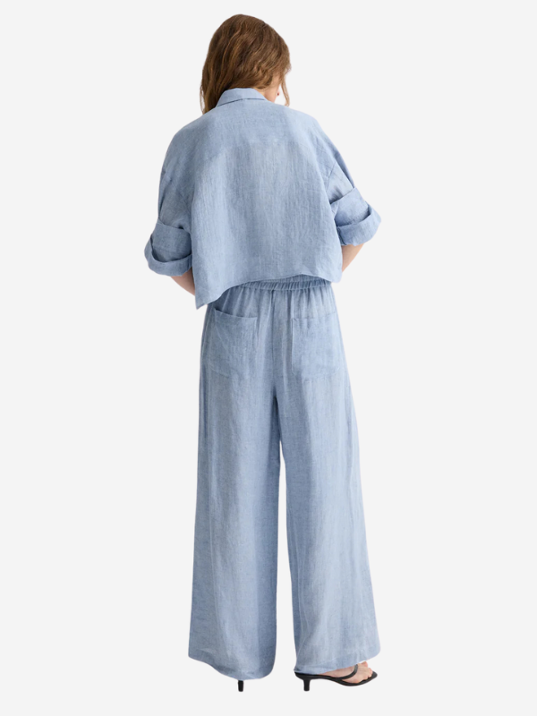 Main Street Pant in Light Indigo displayed on a model, emphasizing the relaxed style and cotton drawstring.