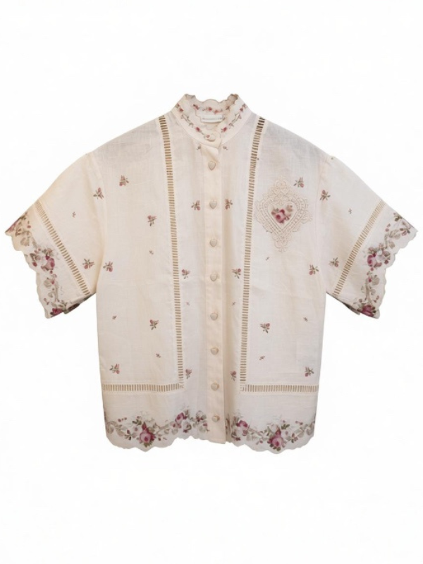 Patience Shirt in Cream/Pink Rose by Zimmermann, featuring a relaxed fit, heart-shaped buttons, scalloped edging, and intricate floral embroidery, perfect for luxury resort wear.