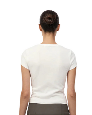 Close-up of the fabric of the Organic Cotton Baby Tee in White from St. Agni, highlighting its soft texture made of 100% organic cotton.