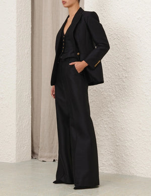 Side angle of the Hypnotic Tailored Jacket in Black, featuring its elegant single breasted closure and tailored fit from Zimmermann.