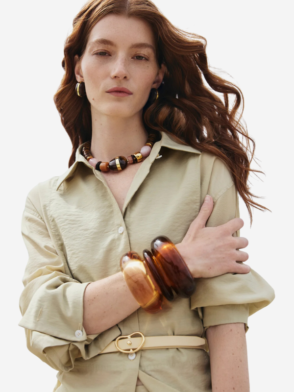 Close-up of the Arc Cuff in Tortoise by Lizzie Fortunato, showcasing its unique resin design.