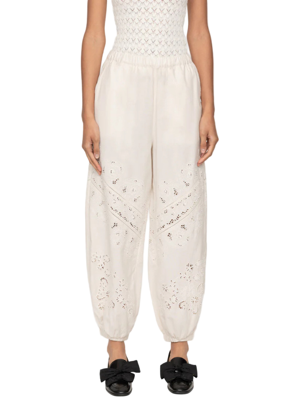 Close-up view of Shanna Lace Track Pants in Cream highlighting the sheer lace accents for a romantic look.