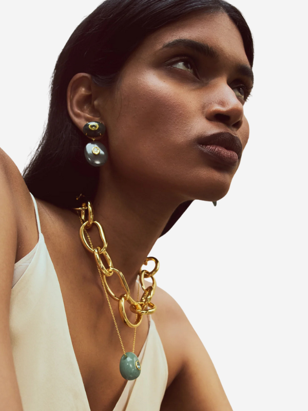 Close-up view of the Constance Necklace in Green Aventurine featuring the natural variations of the green aventurine pendant and sparkling fern green topaz accents, perfect for stylish accessorizing.