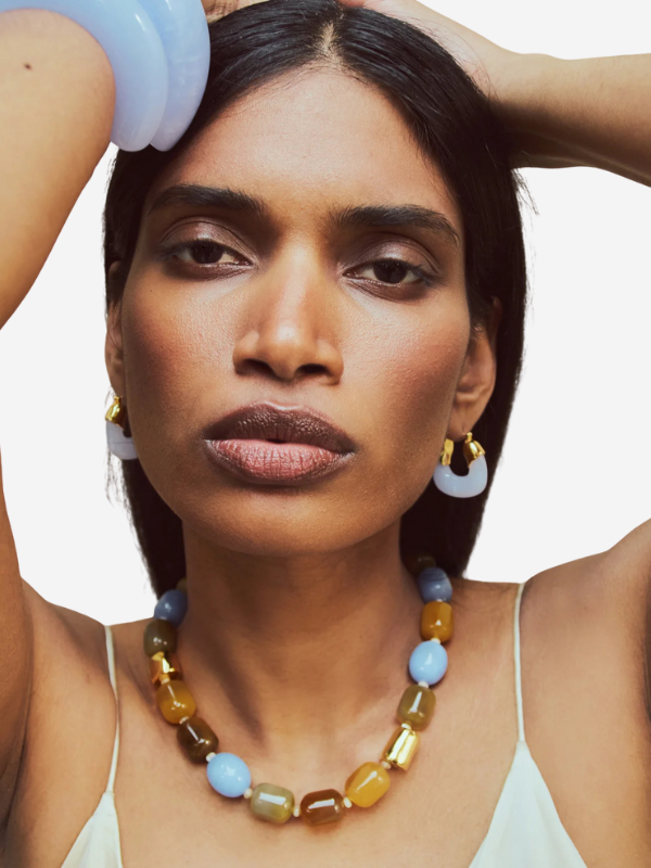 Detailed view of Mini Organic Hoops in Marbled Blue Lace, designed by Lizzie Fortunato with a stylish drop for versatile wear.