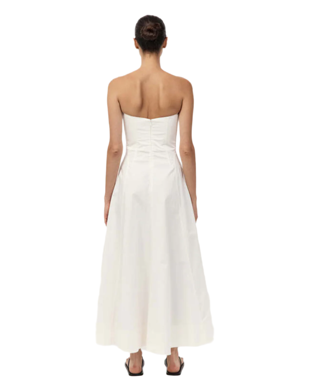 Model wearing the Sculpted Cotton Strapless Dress in Milk, perfect for summer occasions.