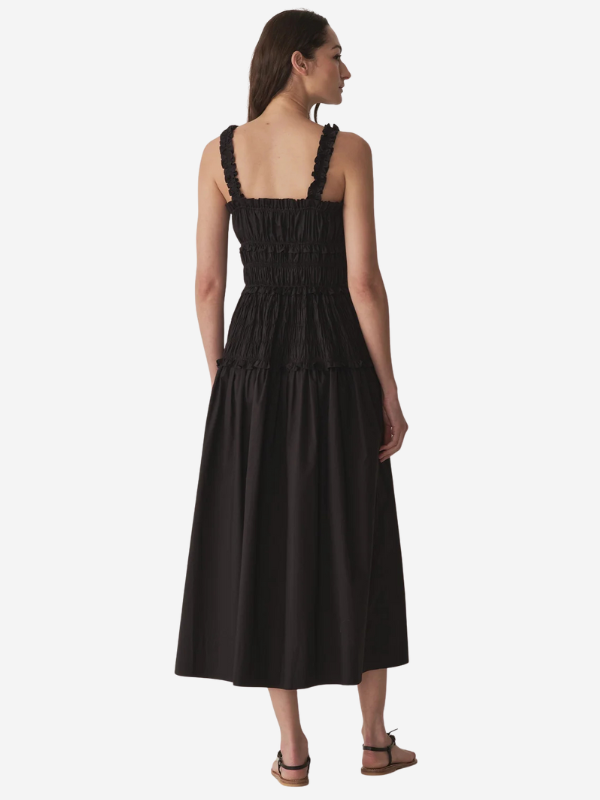 Full-length skirt of the Marianne Dress in Black, made from 100% organic cotton, perfect for any occasion.