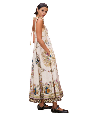 Model wearing the Antoinette Ballet Sundress in Cream, showcasing its elegant style and comfortable fit. An essential ballet sundress cream for your wardrobe.