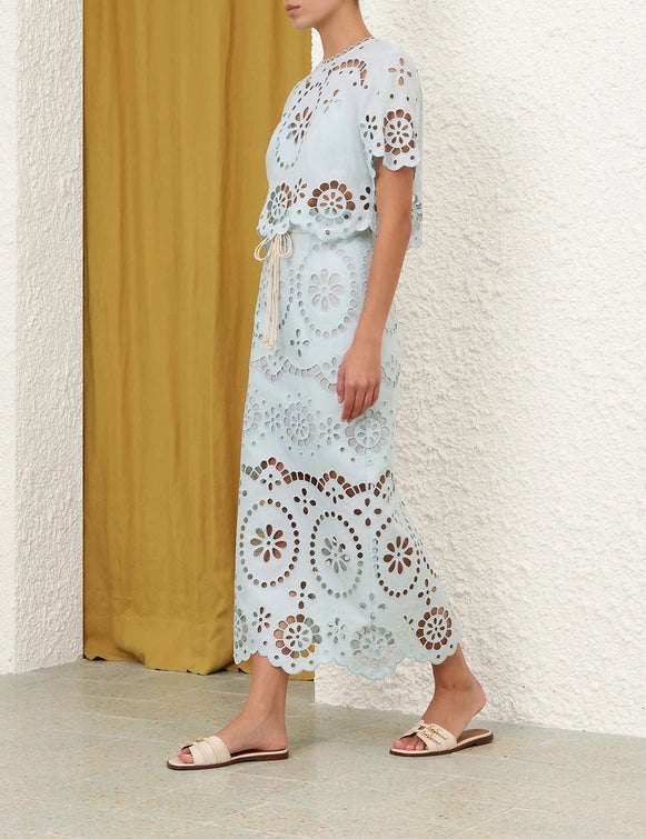 Full view of the Awaken Embroidered Skirt in Mint highlighting the midi length and elegant design.