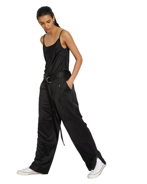 Elliot Cami in Black - Adjustable thin strap design showcasing sleek black fabric and subtle SA logo at the back.