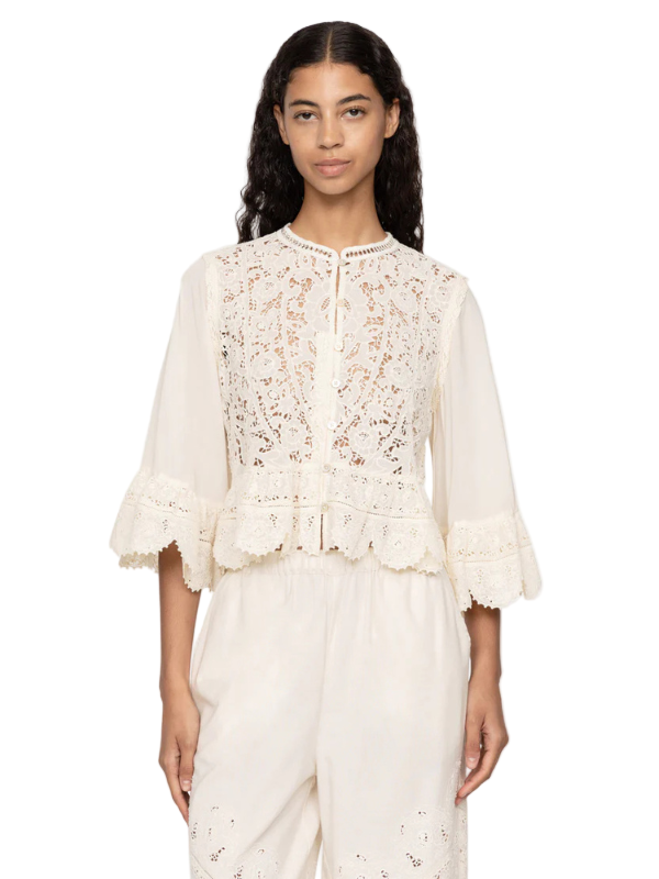 The Shanna Lace Top in Cream styled casually, perfect for a chic vintage-inspired outfit.