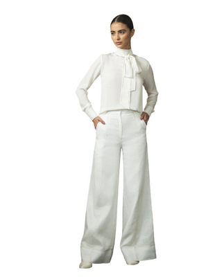 Close-up detail of the Esperandote pant in Off White, showcasing the hidden front zip by Andres Otalora.