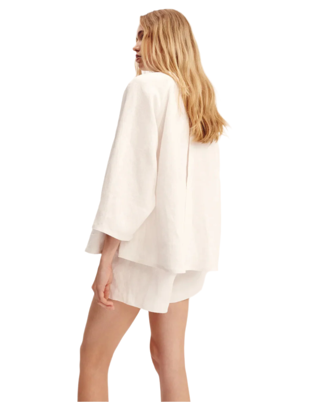 Olivia Blouse in Ivory displayed on a model, a versatile ivory blouse for women suitable for different occasions.