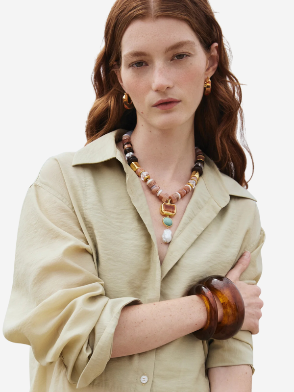 Close-up of Lizzie Fortunato Ridge Cuff in Tortoise showing the thin, domed design and glossy finish that elevates any outfit.