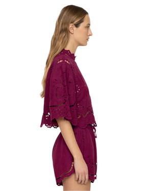 Close-up of the Lula Embroidery Top in Jam, highlighting the beautiful embroidered eyelet design and textured fabric, ideal for adding elegance to any outfit.