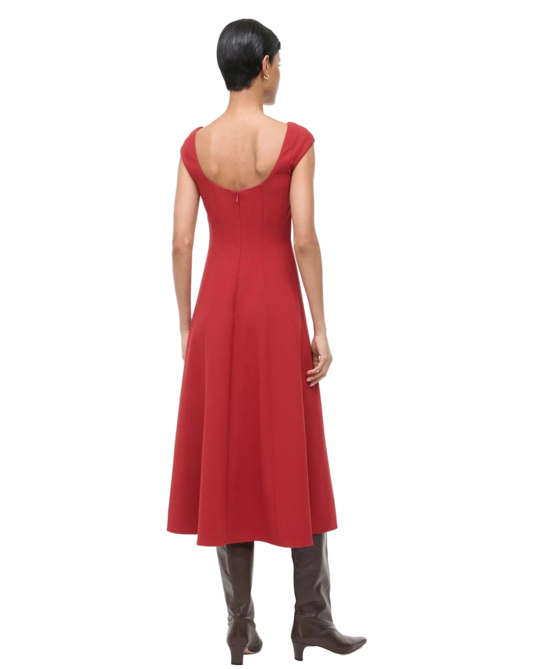 Model wearing the Charlotte Dress in Rouge from Staud, styled for a trendy look perfect for any occasion.