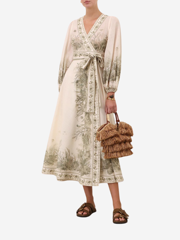 Side view of the Wanderlust Wrap Midi Dress in Khaki Toile showcasing the self-tie waist detail and flirty frill pleats.