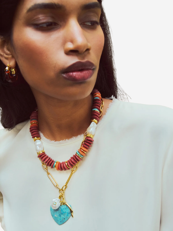 Close-up view of Mini Organic Hoops in Tortoise - Stylish hoop earrings featuring a tortoise shell design by Lizzie Fortunato.