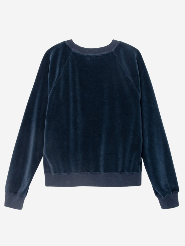 Close-up of Xirena’s Pierre Velour Sweatshirt in Sapphire showcasing the softness and detailed heart embroidery design.