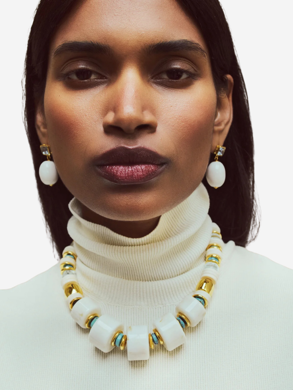 Stylish Granada Necklace in Blanco by Lizzie Fortunato displayed on a model, highlighting its elegant design and colorful beads.