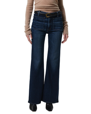 Close-up of the Kimberly Patch Pocket Flare in Mirka, accentuating the subtle fading and modern utility design elements.
