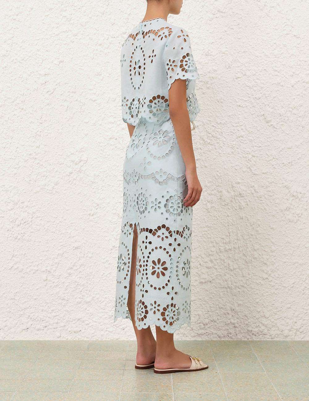 The back view of Awaken Embroidered Bodice in Mint, featuring an invisible zip closure.