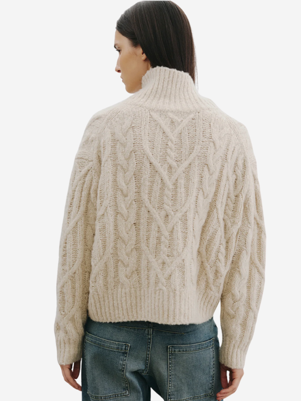 Back view of the Nili Lotan Fairiny Sweater in Beige Melange displaying the fashioning detail at the armhole and shoulder.