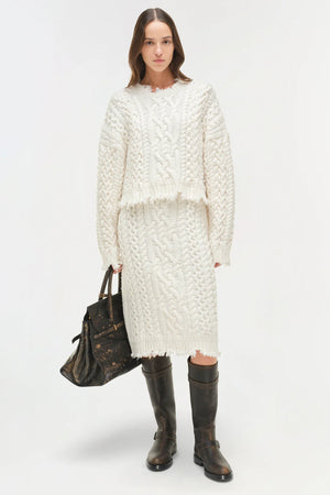 Back view of the Felix Knit Cropped Sweater in Ivory, showing off its relaxed silhouette.