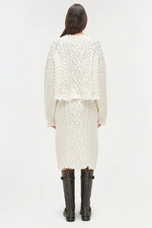 Side angle of the Felix Knit Cropped Sweater in Ivory, displaying the cropped cut and elegant fit.
