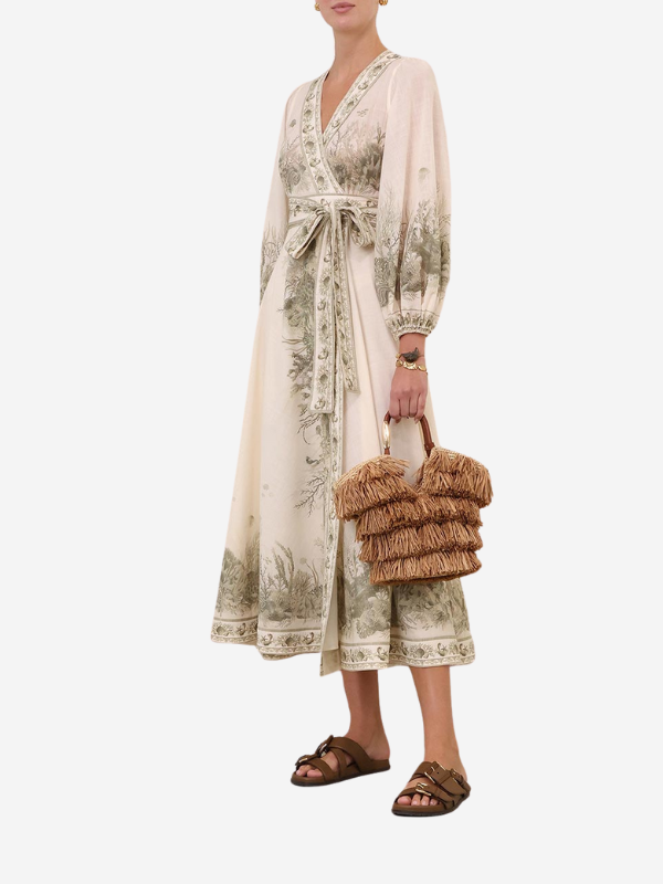Back view of the Wanderlust Wrap Midi Dress in Khaki Toile highlighting the long sleeves and elasticated cuffs by Zimmermann.