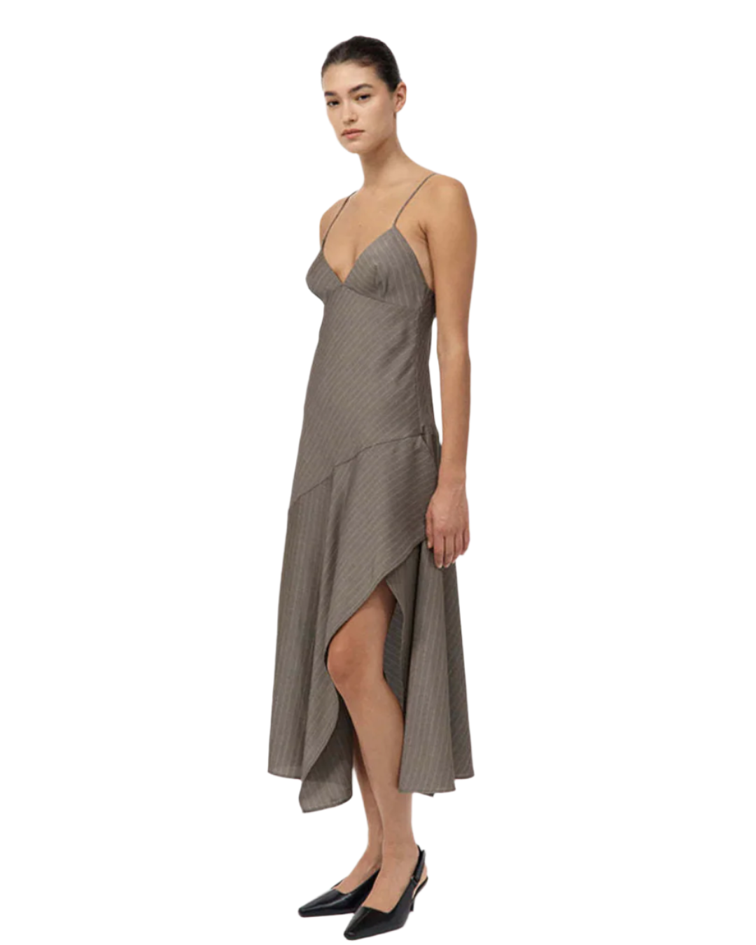 Back view of the Asymmetric Slip Dress in Khaki Pinstripe, emphasizing its unique asymmetric hem design. Perfect choice for a stylish asymmetric slip dress.