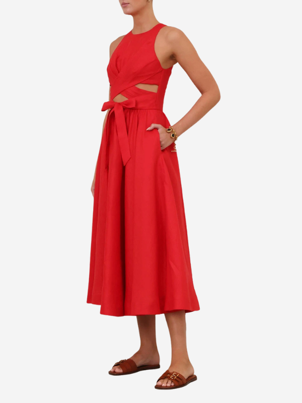 Side view of the Patience Midi Dress in Dark Red highlighting the heavily pleated skirt.