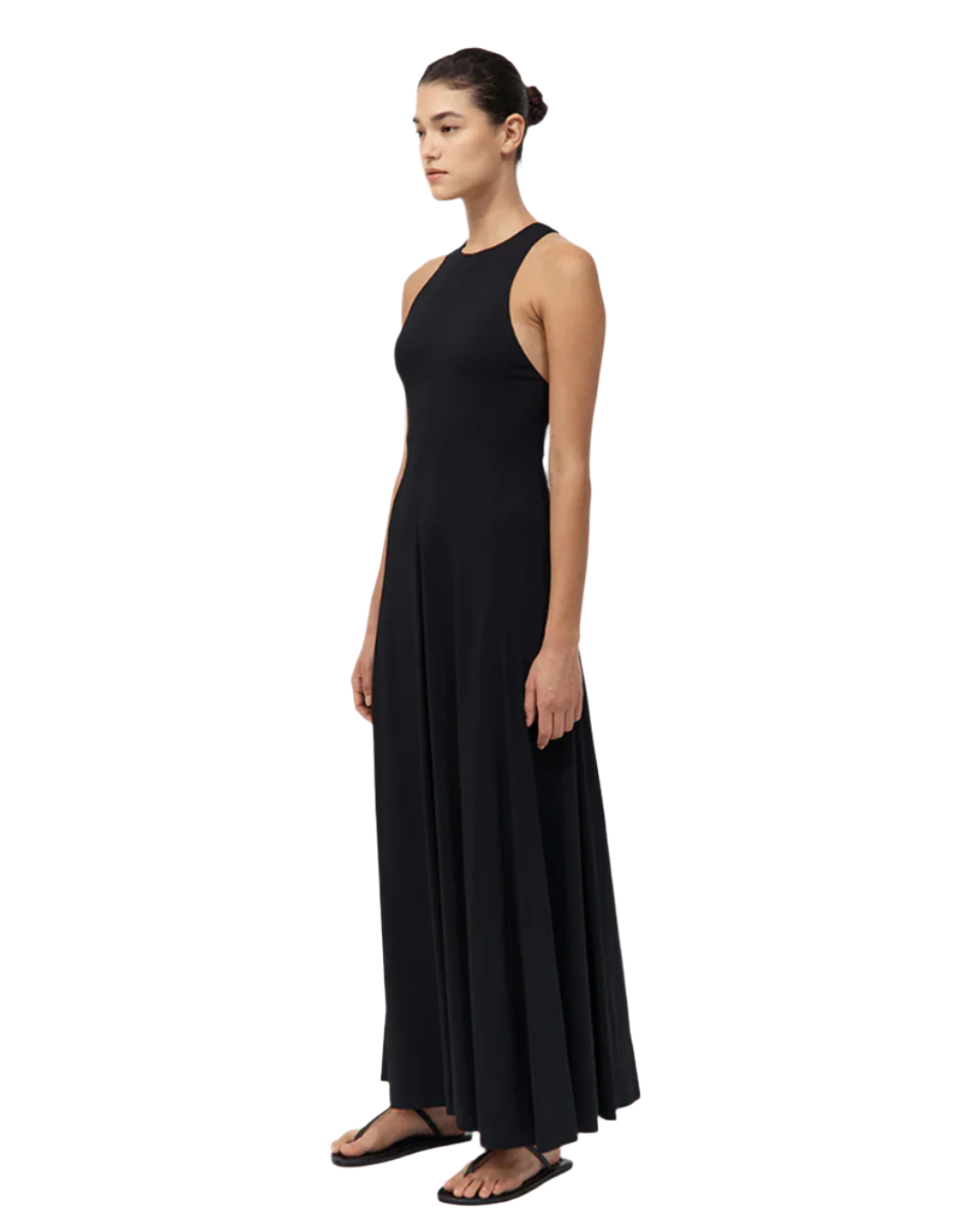 Back view of the Cut Away Maxi Dress in Black, emphasizing the graceful flow and movement of the fabric.