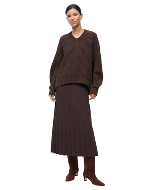 Close-up of Lena Skirt in Earth by Staud showcasing the knit texture and elegant waist details.