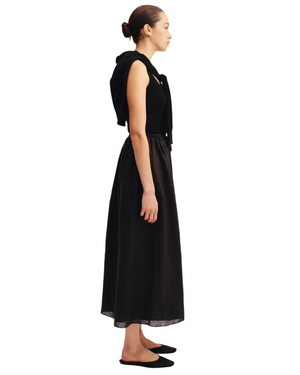 Detailed view of the Ginny Skirt in Black, a fashionable black linen skirt with gathering for extra flair.