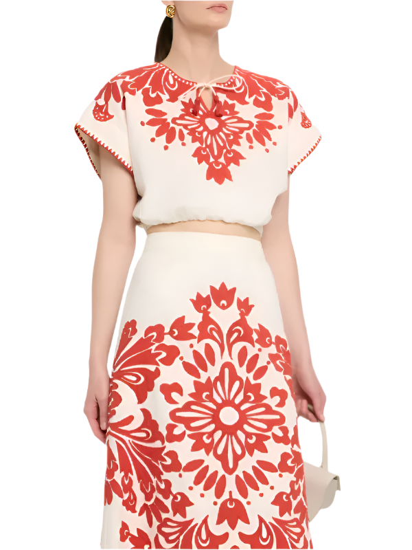Back view of the Lilana Applique Top in Red, highlighting its cropped silhouette and comfortable fabric.