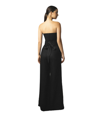 Model wearing the Un Secretito in Black jumpsuit by Andres Otalora styled with a detachable rope belt.