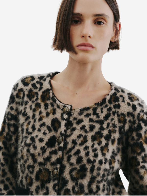 Beyton Cardigan in Jute Leopard displayed on a hanger, highlighting its brushed cashmere silk blend texture.