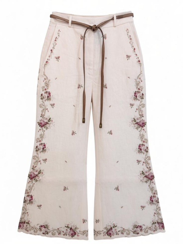 Luxurious Patience Flare Pant in Cream/Pink Rose by Zimmermann, showcasing a delicate linen fabric with intricate floral placement print and stylish flared legs, perfect for resort wear.