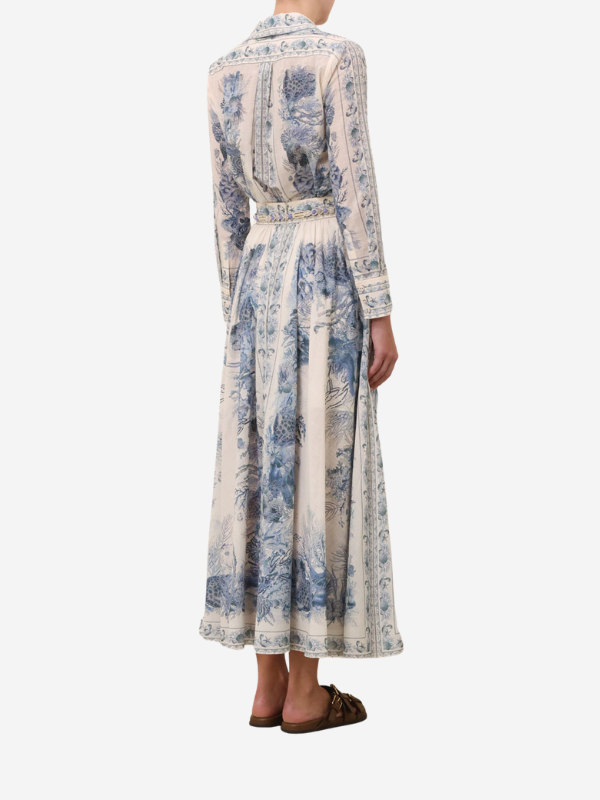 Wanderlust A-Line Maxi Skirt in Blue Toile displayed on a model, demonstrating its flowy silhouette and chic style for any occasion.