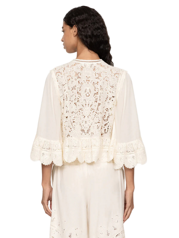 Back view of the Shanna Lace Top in Cream with intricate lace design and elegant detailing.