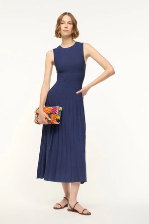 Close-up of the stitch detailing on the Elyse Dress in Navy, highlighting the quality craftsmanship by Staud.