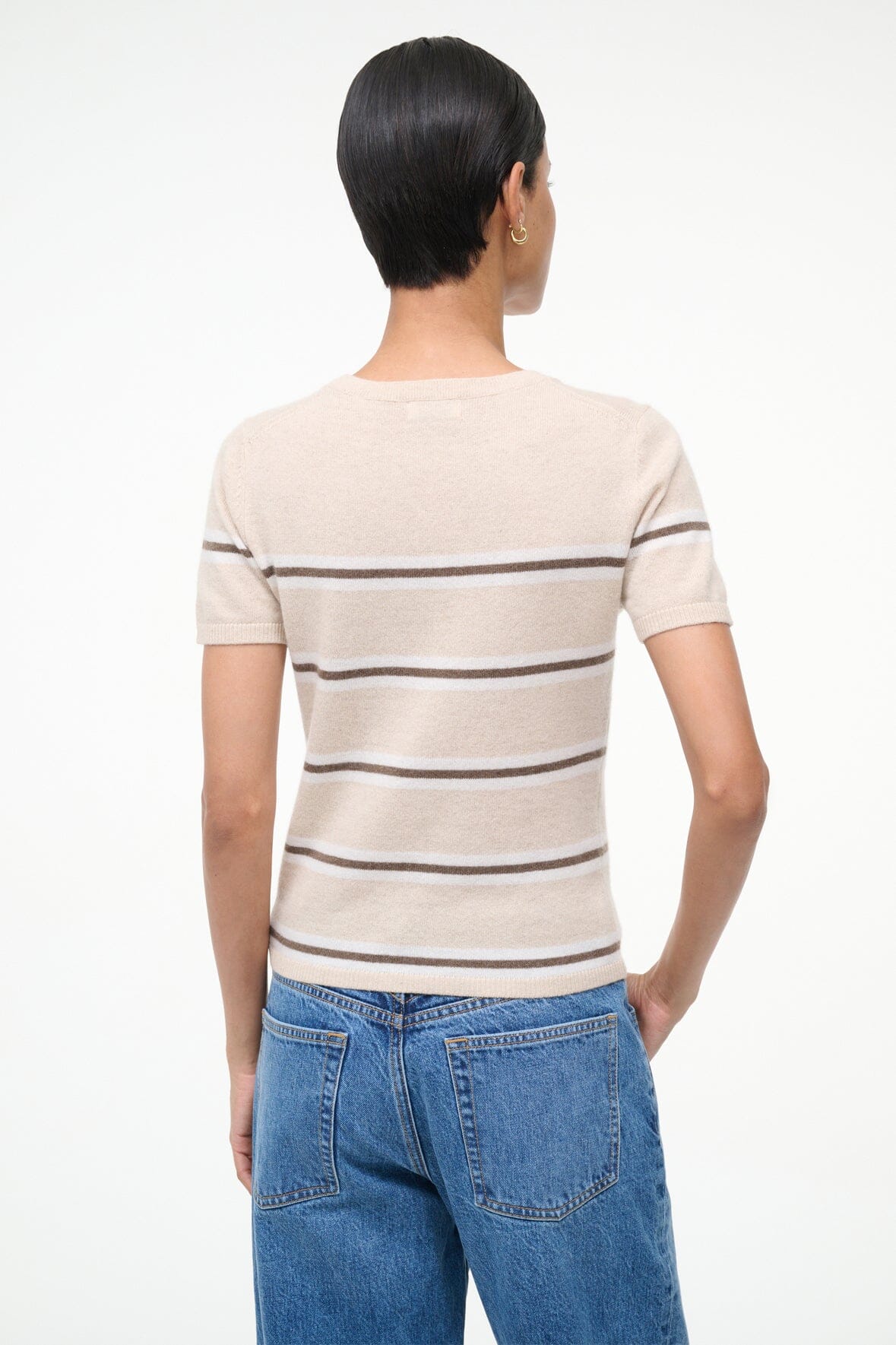 Model wearing the Easy Cashmere Tee in Whisper Stripe by Staud, demonstrating the comfortable fit and stylish look.